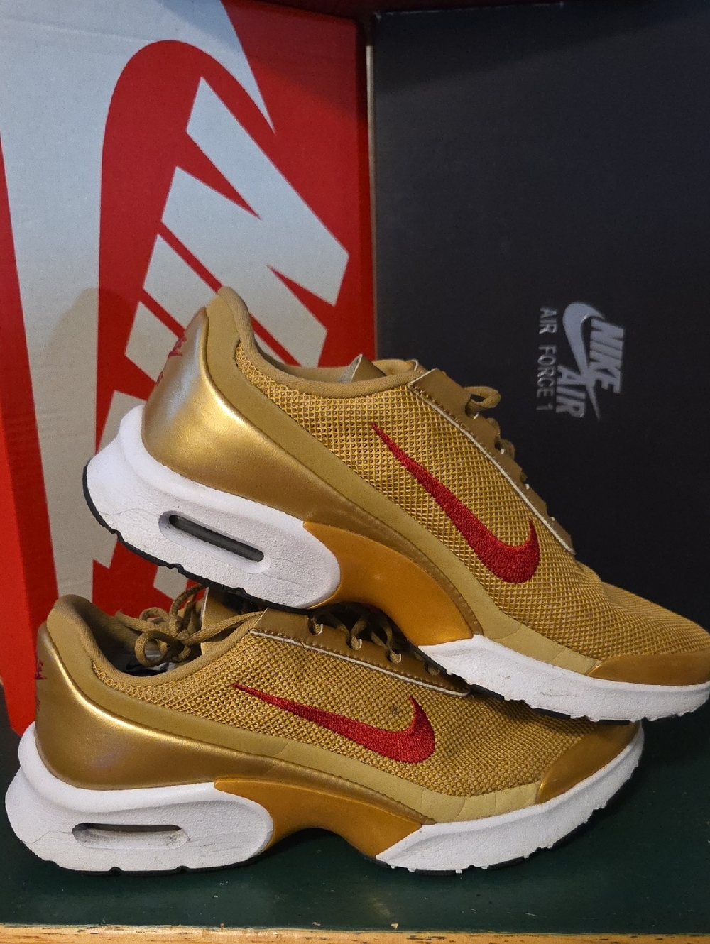 Nike Women’s Gold Mesh Athletic Sneakers with Red Swoosh